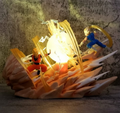 Figura Diorama Lámpara Goku Vs Vegeta Super Saiyan Dragon Ball Z Con Luces LED 20cm - Esfera dorada iluminada sobre base de roca